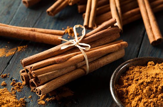 Organic Raw Brown Cinnamon on a Background